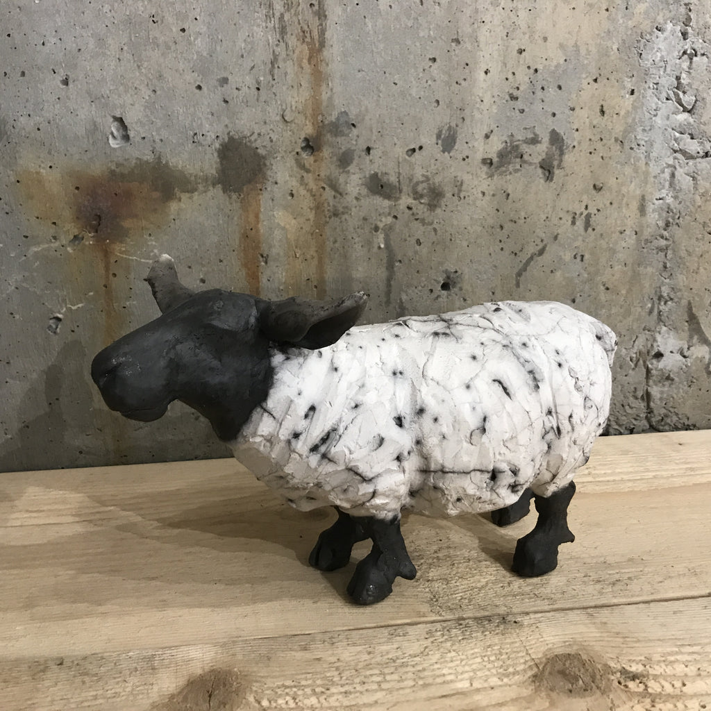 Ceramic sheep fired in a raku kiln